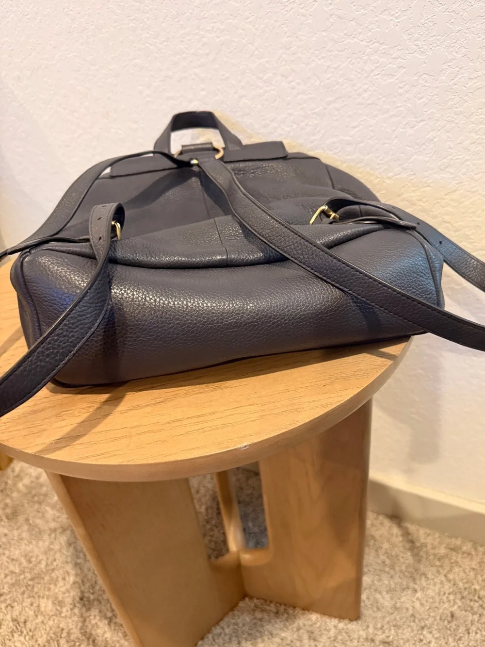 COACH Black Pebbled Leather Drawstring Backpack with Front Pockets